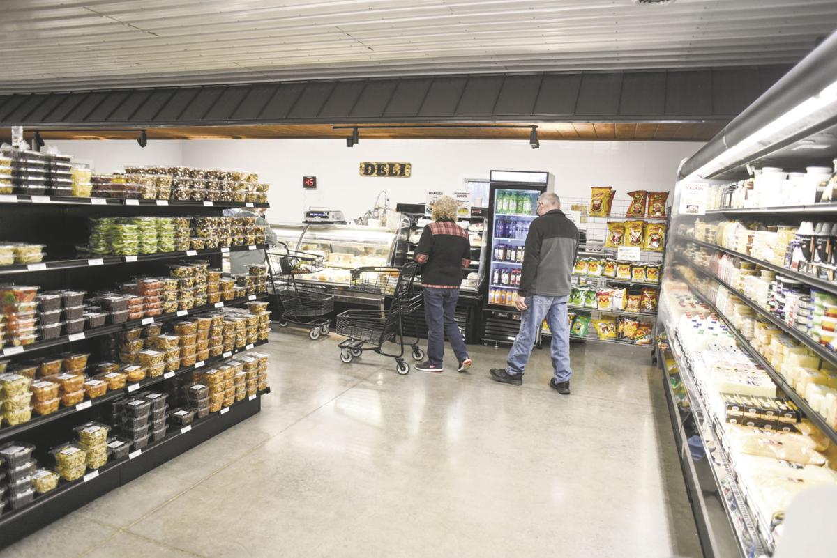 Family returns from missions to open market, greenhouse and garden center Business