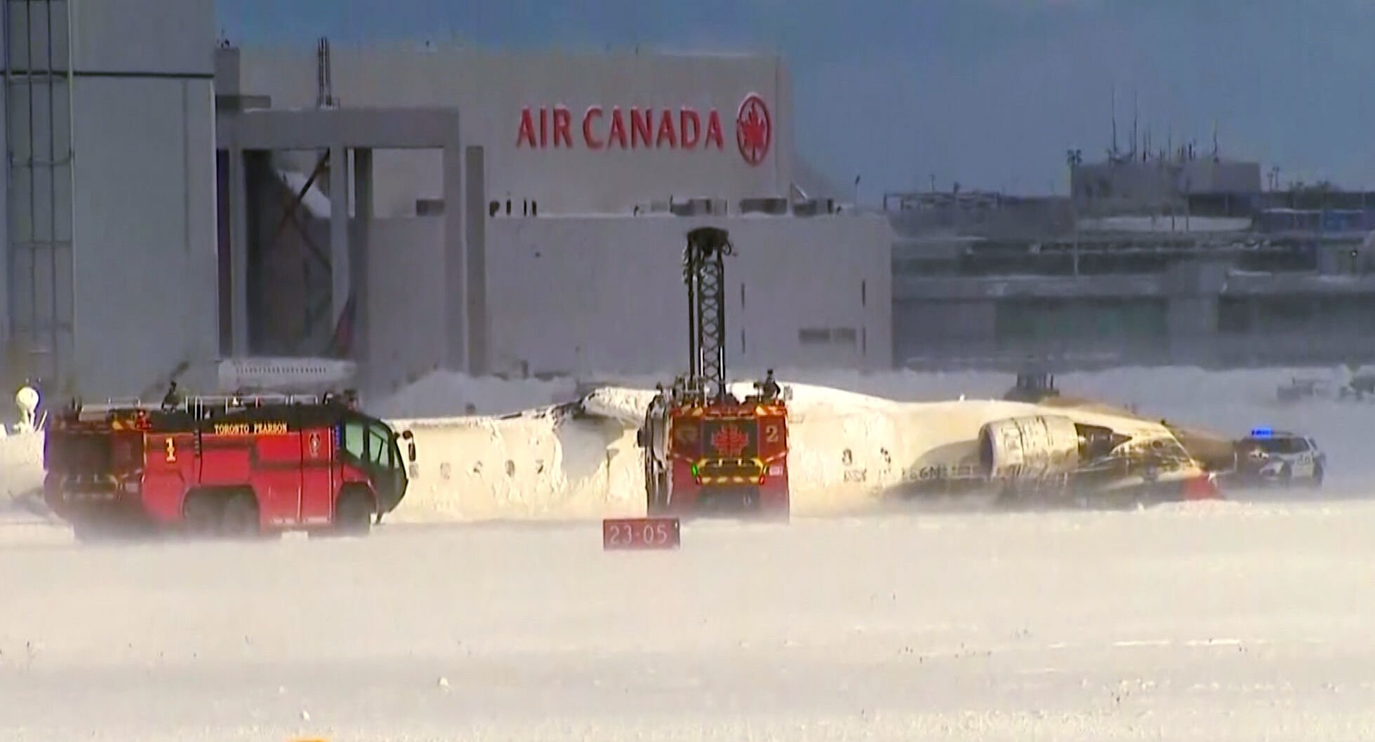 Delta Airlines plane flips on landing in Toronto and a badly hurt child