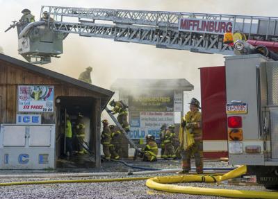 fire boomerangs dailyitem millmont firefighters smoke grill battle friday bar during through