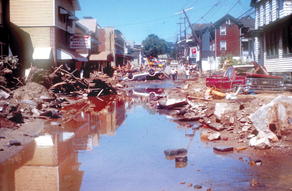 WATCH VIDEO ‘A river of debris’ Swollen streams and broken dams