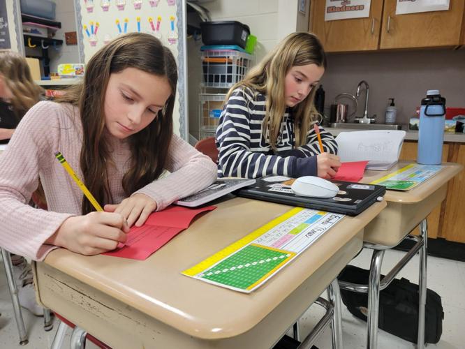 Students write Christmas cards to veterans News