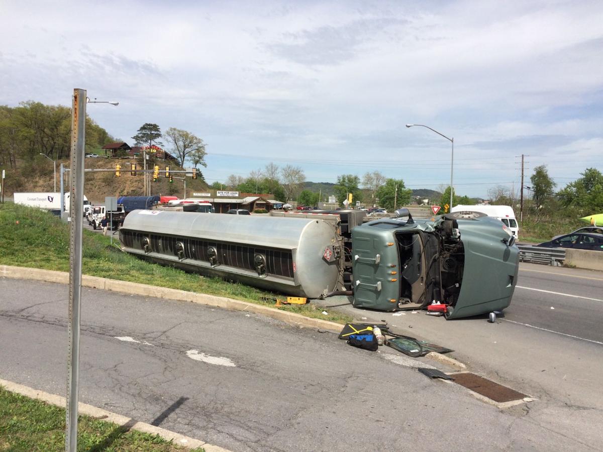 UPDATE Tanker truck rolls onto side at 11/15 split News