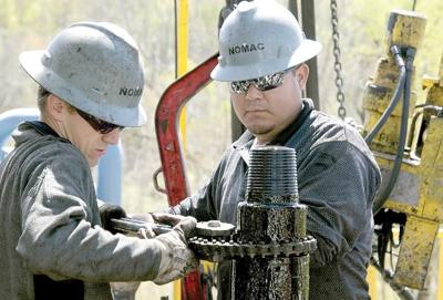 gas natural dailyitem well chesapeake casing workers move section energy april place site into