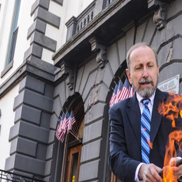 Activist Ignites Discussion By Burning Nazi Confederate Flag