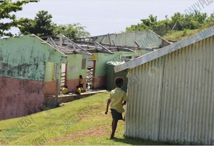 Students at Melsisi Primary and Secondary School are using still temporary shelters, more than two years after cyclone Harold destroyed their classrooms. Photos: Hilaire Bule