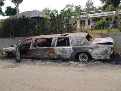 Stretched limo in flames