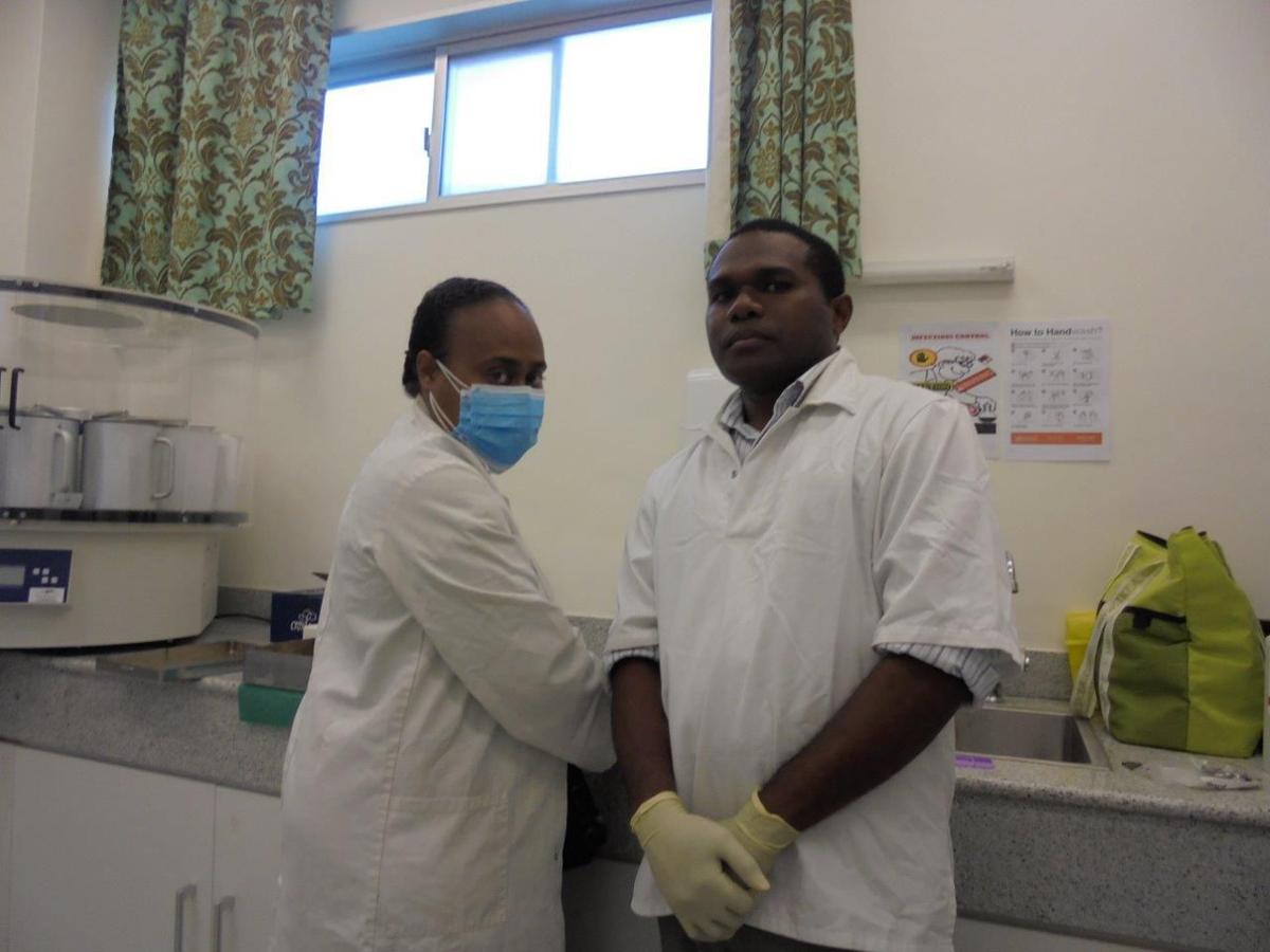 Dr Crystal Garae with lab technician
