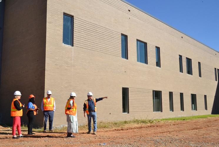 ACS officials view progress on new consolidated building | News ...