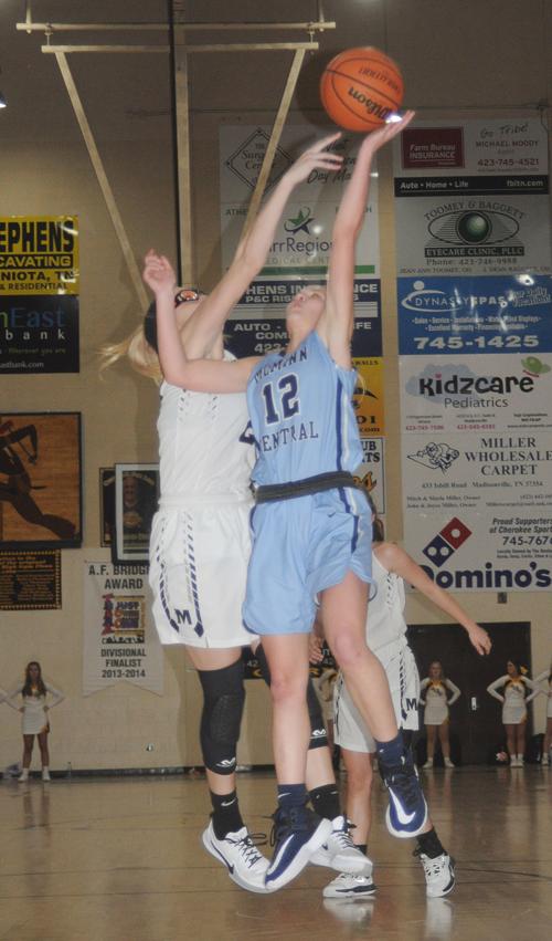 Central's Kellan Baker to the hoop