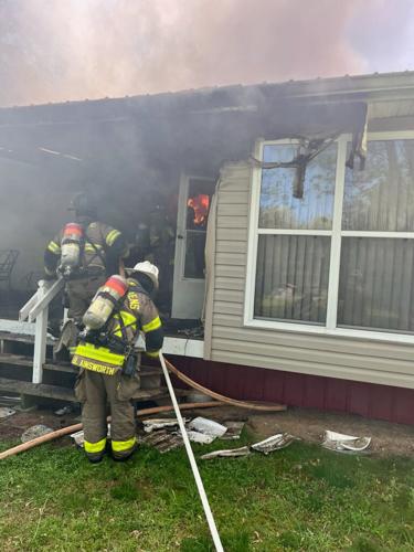 Multiple agencies respond to house, camper fire | News ...