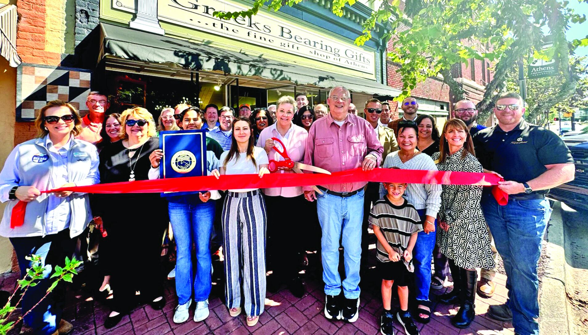 Greeks Bearing Gifts celebrates 30 years with ribbon cutting | News ...