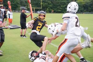 Cherokees, Tigers battle rain, one another in scrimmage