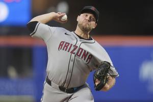 Burnes gets 1st win for Arizona as Diamondbacks hold off Mets 4-3