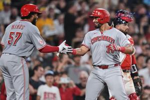 Encarnacion-Strand hits his 1st career grand slam to power Reds' rally to beat Red Sox 8-4