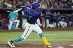 Ildemaro Vargas' 2-run triple highlights rally that pushes the Diamondbacks past Reds 5-3