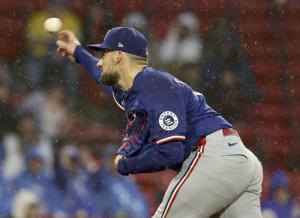 Rangers' bats come alive with new coach Boone in dugout, beating the Red Sox 6-1