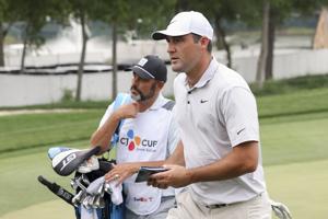 Scottie Scheffler's lead grows to 8 in the dark at his hometown Byron Nelson