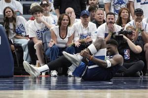 Timberwolves' Edwards leaves Game 2 with sprained left ankle before returning for 2nd half