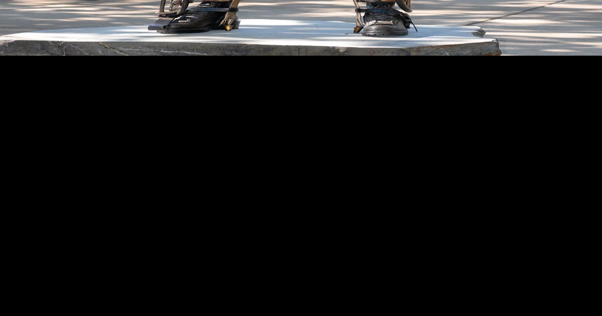 Artist showcases bronze cast statue of electrical lineman on way to