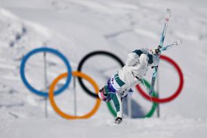 Cooper Woods upsets Mikael Kingsbury for Olympic gold in men's moguls in a tiebreaker