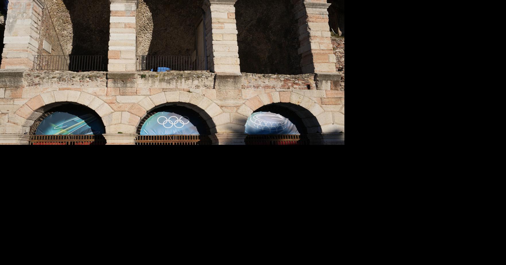 Twin Milan and Cortina Olympic cauldrons are extinguished, signaling the end of Winter Games