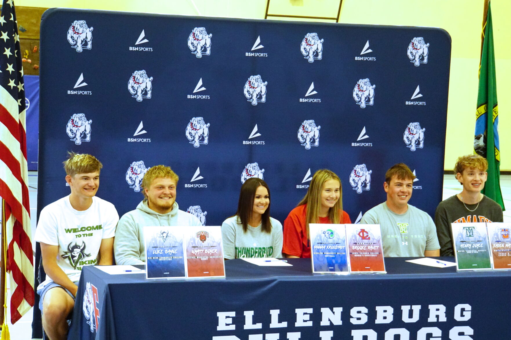 Six Bulldogs athletes sign with college teams