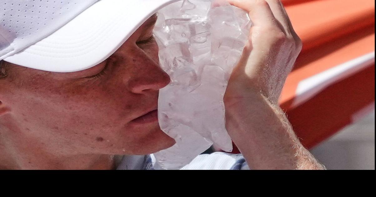 Heat wave raises temperatures at the French Open, in photos