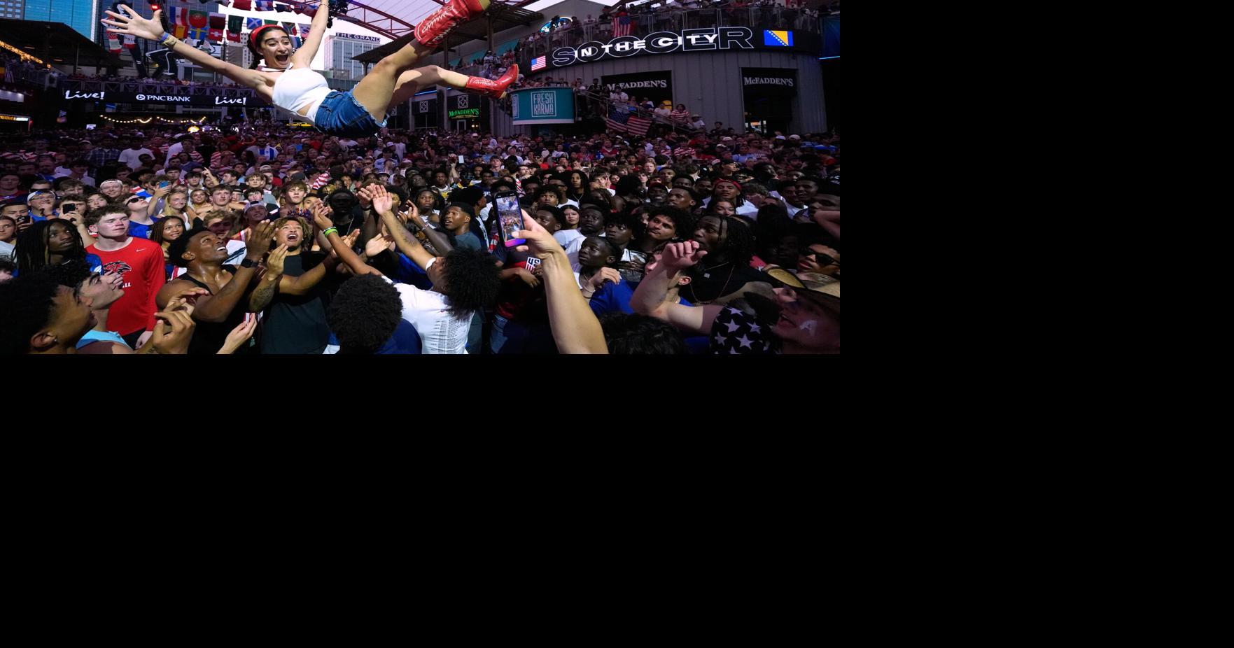 One Extraordinary Photo: Fan goes airborne to celebrate U.S. win