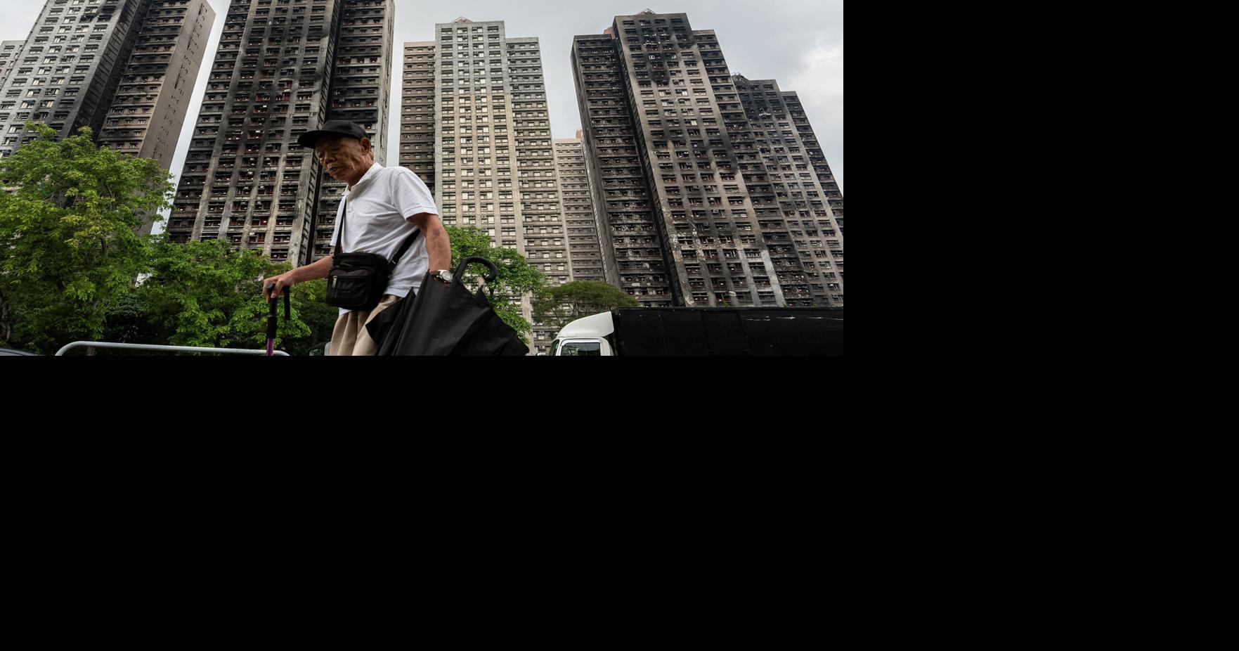 Hong Kong's housing minister resigns after fire investigation finds ...