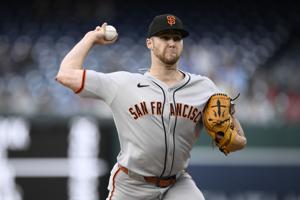Roupp pitches into seventh inning, Giants beat Nationals 4-0