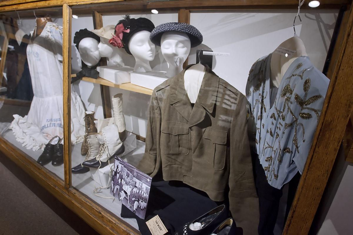 Museum opens exhibit with clothing from the late 1800s Members