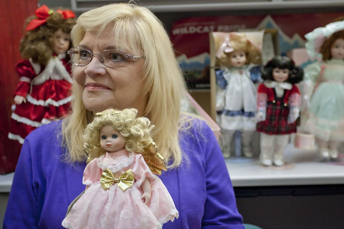 Woman gives 27 dolls to Central’s giftgiving program Members