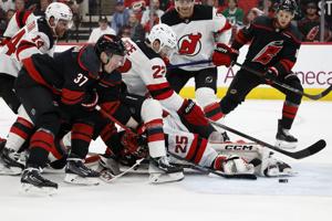 Martinook, Andersen help Hurricanes push past Devils 3-1 for 2-0 lead in 1st-round playoff series