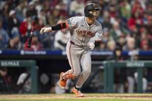 Jung Hoo Lee stars as the surging Giants beat Aaron Nola and the Phillies 11-4