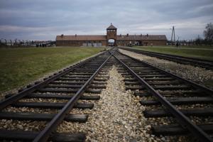 Barstool Sports founder retracts Auschwitz tour offer to customer in antisemitic sign incident