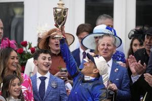 Weeks after fall, jockey Junior Alvarado rebounds to win muddy Kentucky Derby aboard Sovereignty