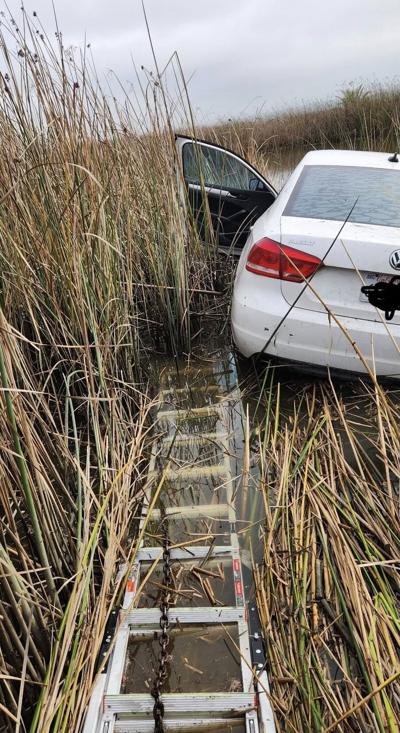 Vehicle crashes through fence; ends in water | News | dailyrepublic.com