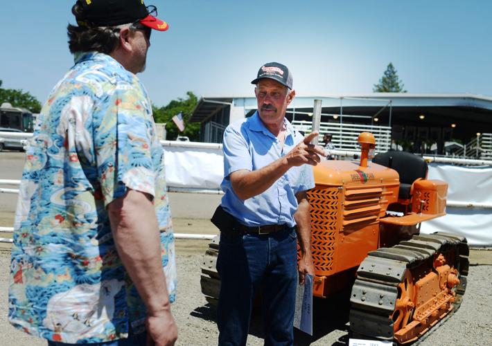 Caterpillar enthusiasts show off tractors, history at Kids Day
