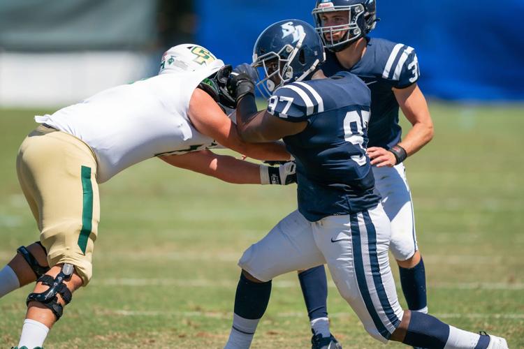 Alumni update Armijo grad Muhindo Kapapa gets 3 sacks in leading USD