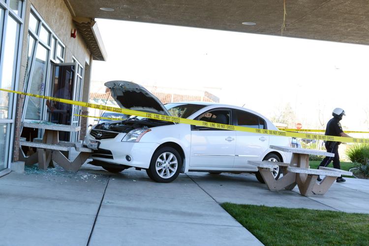 Photos Car crashes into Burger King News