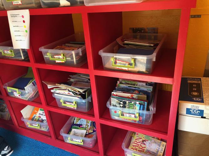 Reading made easy: Mobile library brings books to students for summer ...