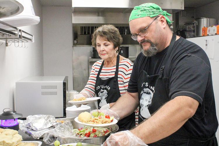 Volunteers serve at Jo's Diner Local News