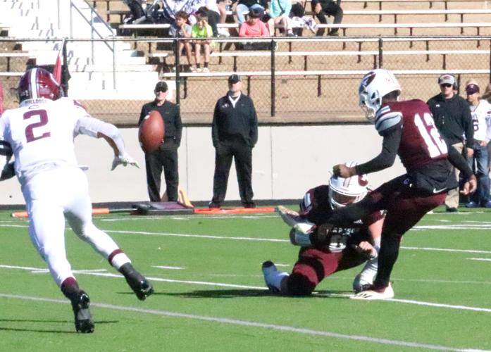 Garrison wins battle of Bulldogs, advances to quarterfinals Sports