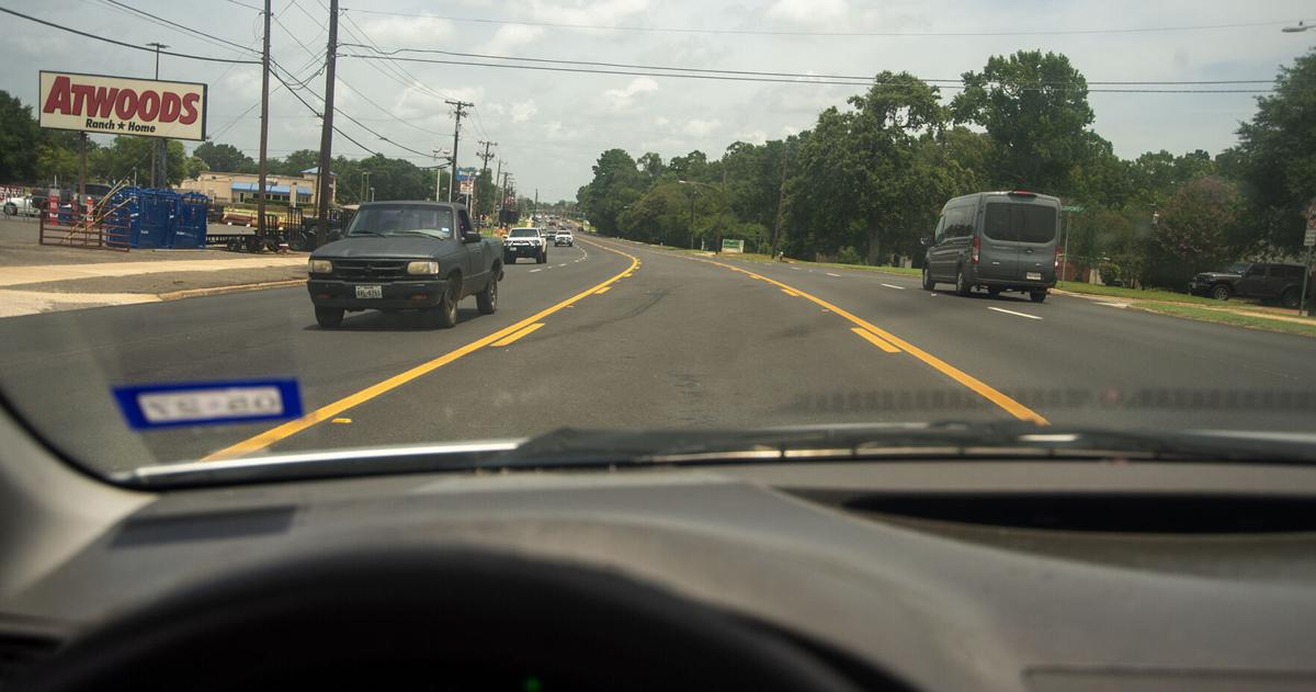 Contractors work on North Street pavement transitions, turn lane stays as is