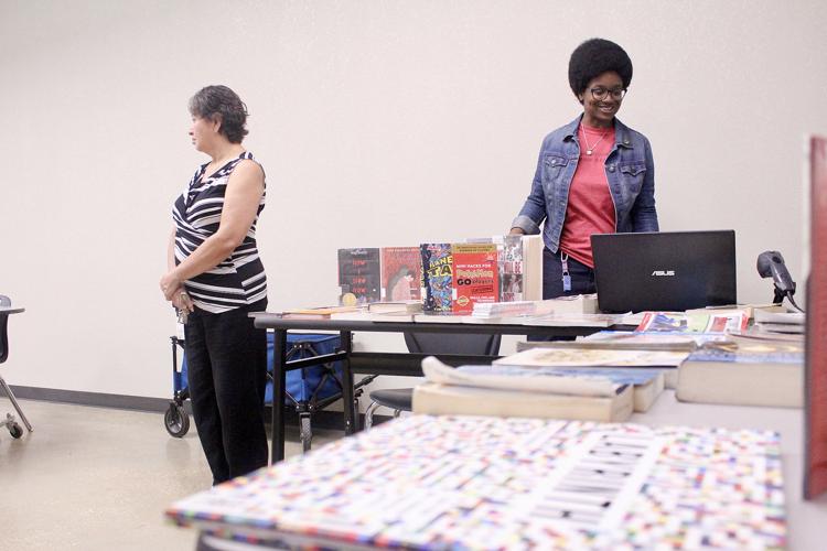 Public library hits road to fill void, create readers at Malcolm Rector