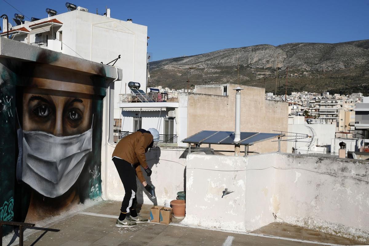 Greece Virus Outbreak Graffiti