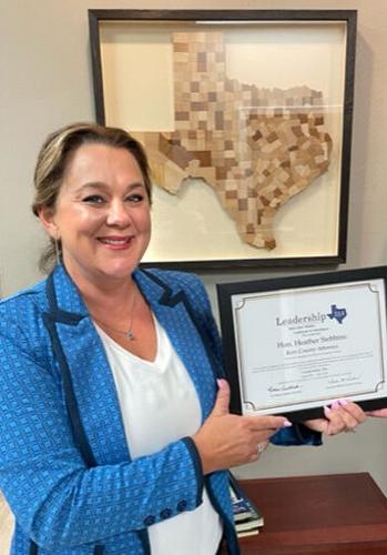 County attorney graduates from distinguished program | News