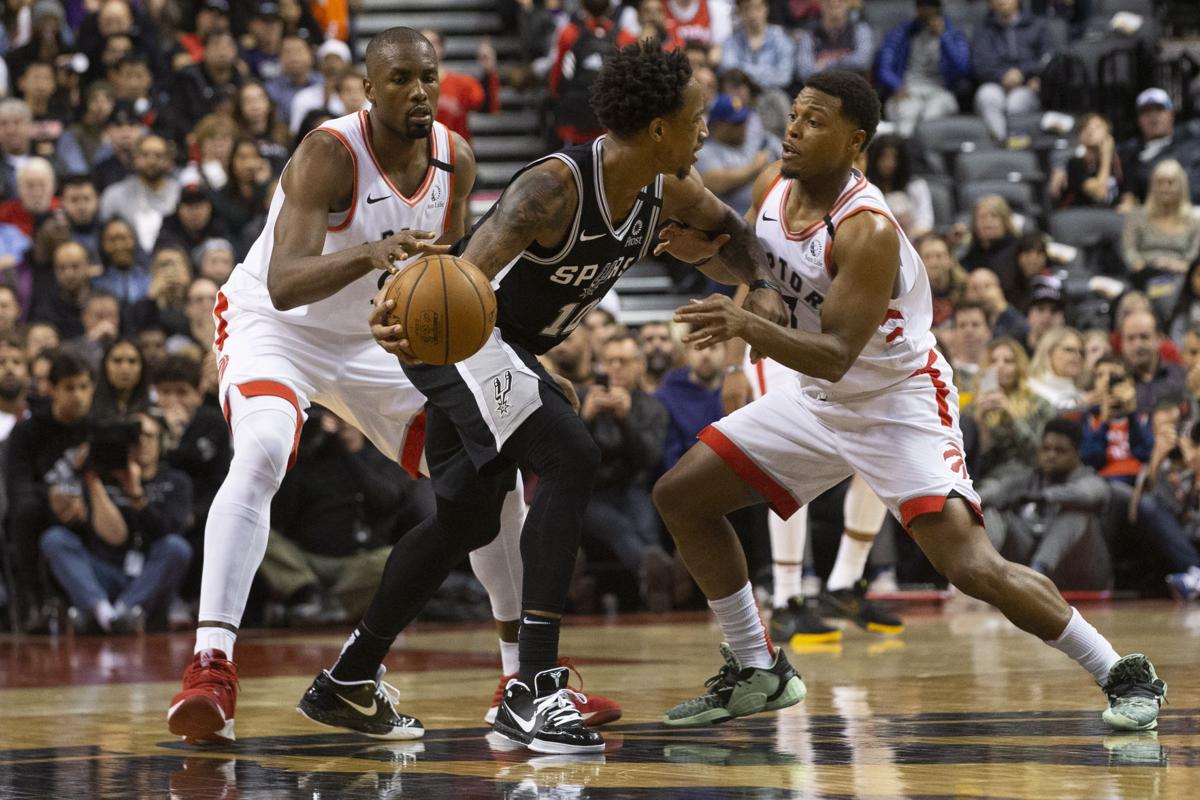 Spurs Raptors Basketball
