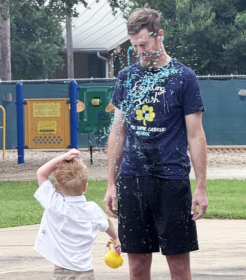 Notre Dame student enjoys opportunity to ‘slime’ his dad | Education ...