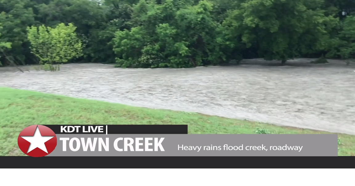 After a day of flooding, Kerrville's Town Creek settles down